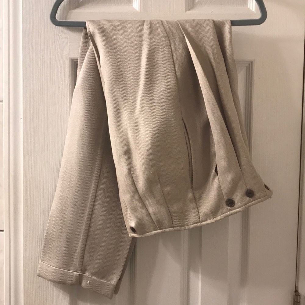 Juniors Beige Pants with pleated front.